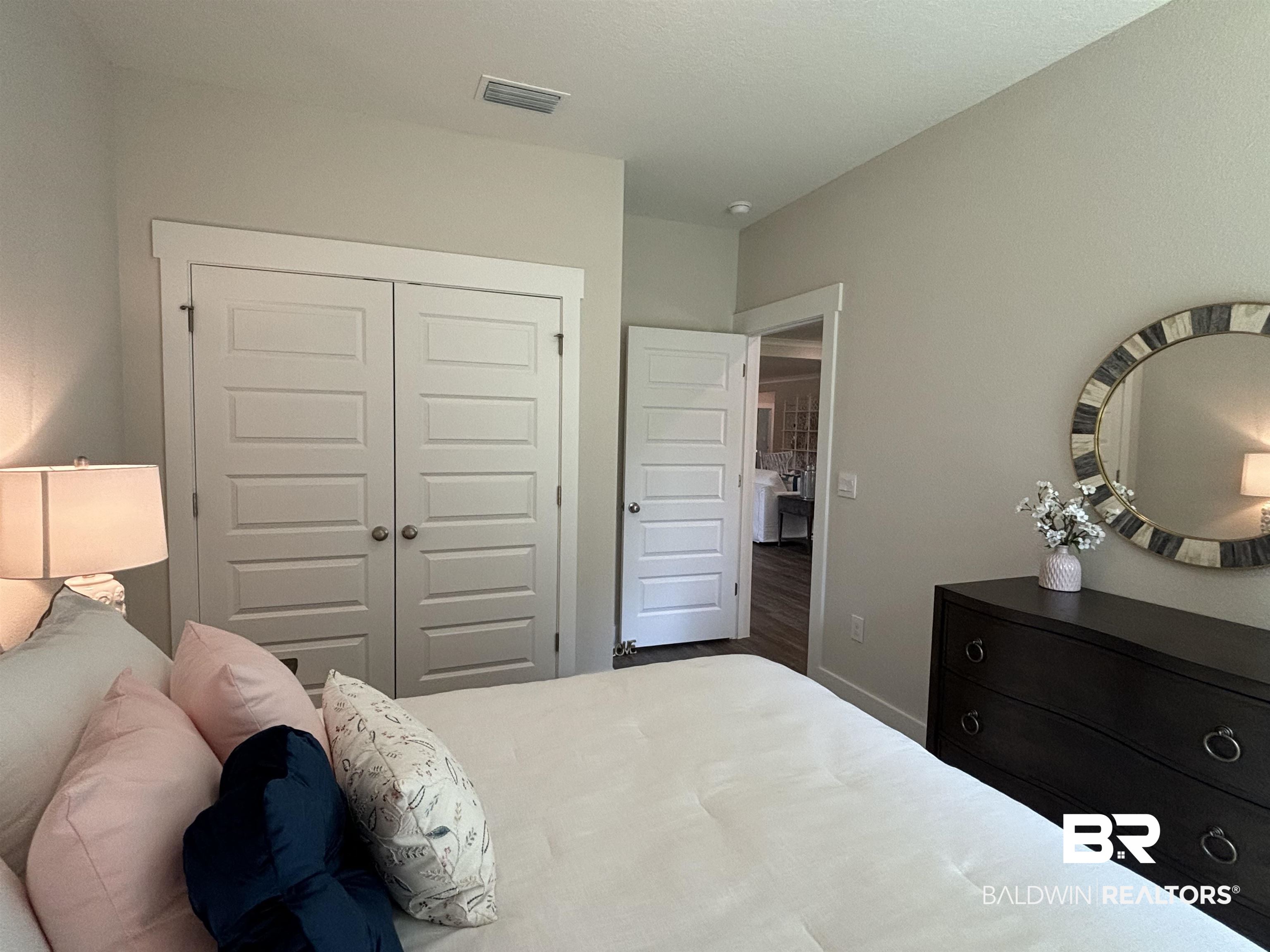 370 Barndling Street Fairhope, AL 36532 - Photo 24 of 30 Bedroom featuring hardwood / wood-style floors and a closet