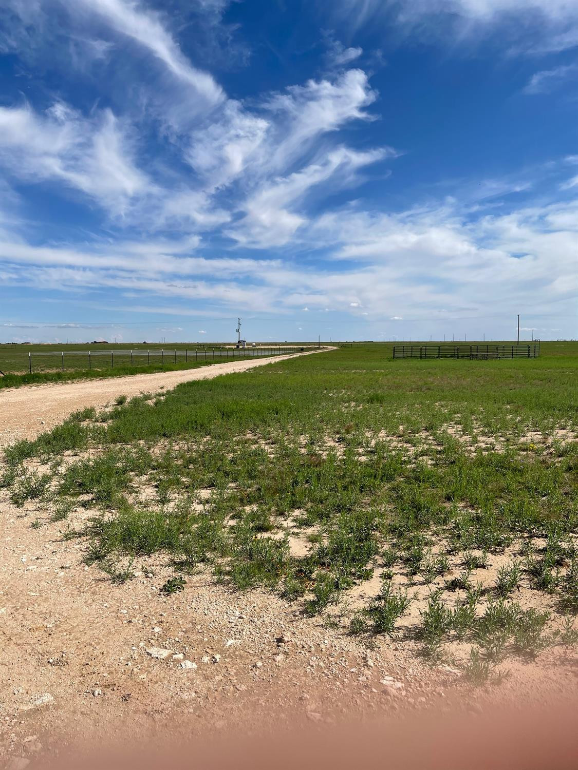6 Quail Road Lubbock, TX 79407 - Photo 5 of 6 a view of an ocean and beach