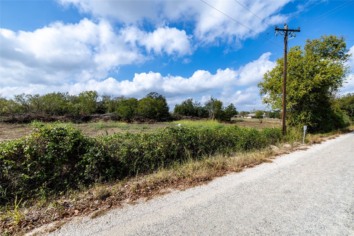 Lot 1 Sunset Trail Luling, TX 78648 - Photo 2 of 6 a view of a lake with a city view