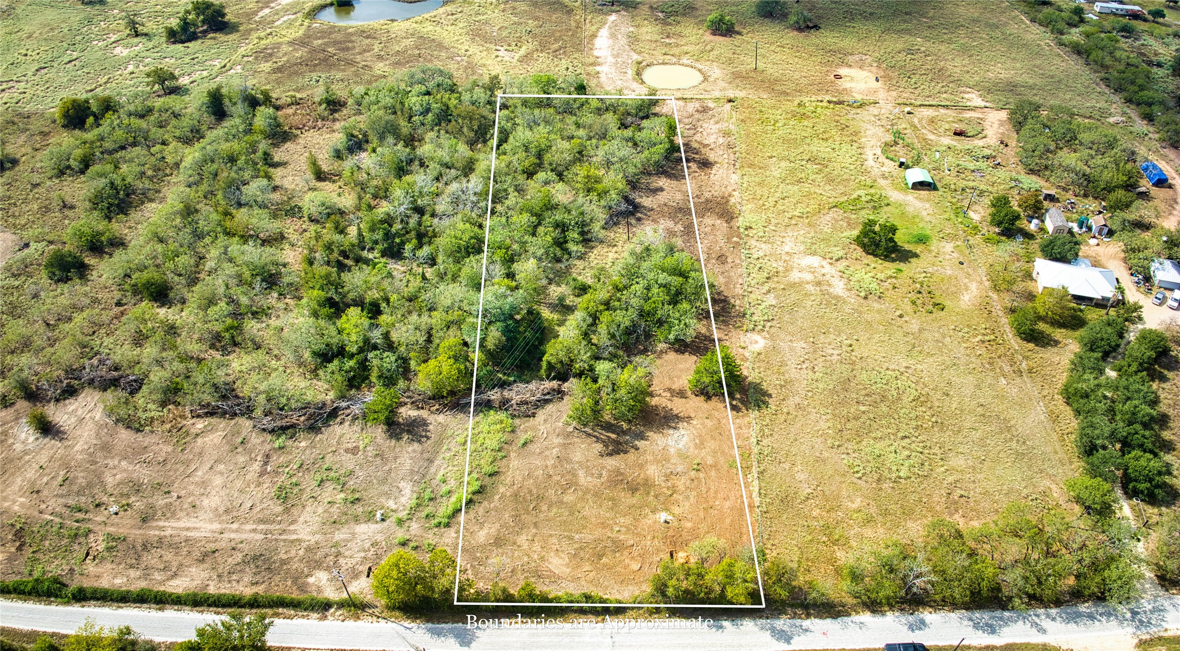 Lot 1 Sunset Trail Luling, TX 78648 - Photo 5 of 6 a view of a garden