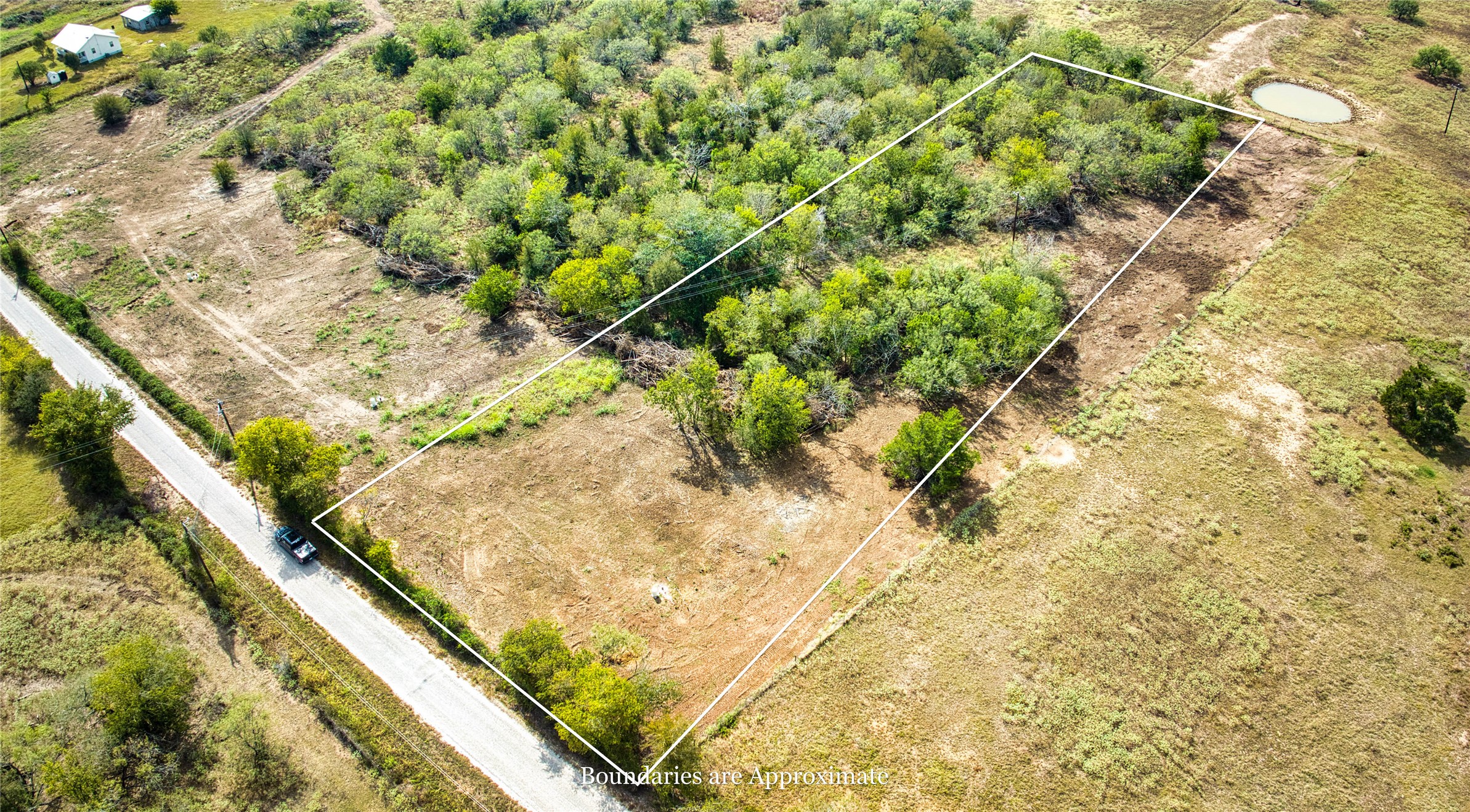 Lot 1 Sunset Trail Luling, TX 78648 - Photo 6 of 6 a view of a yard