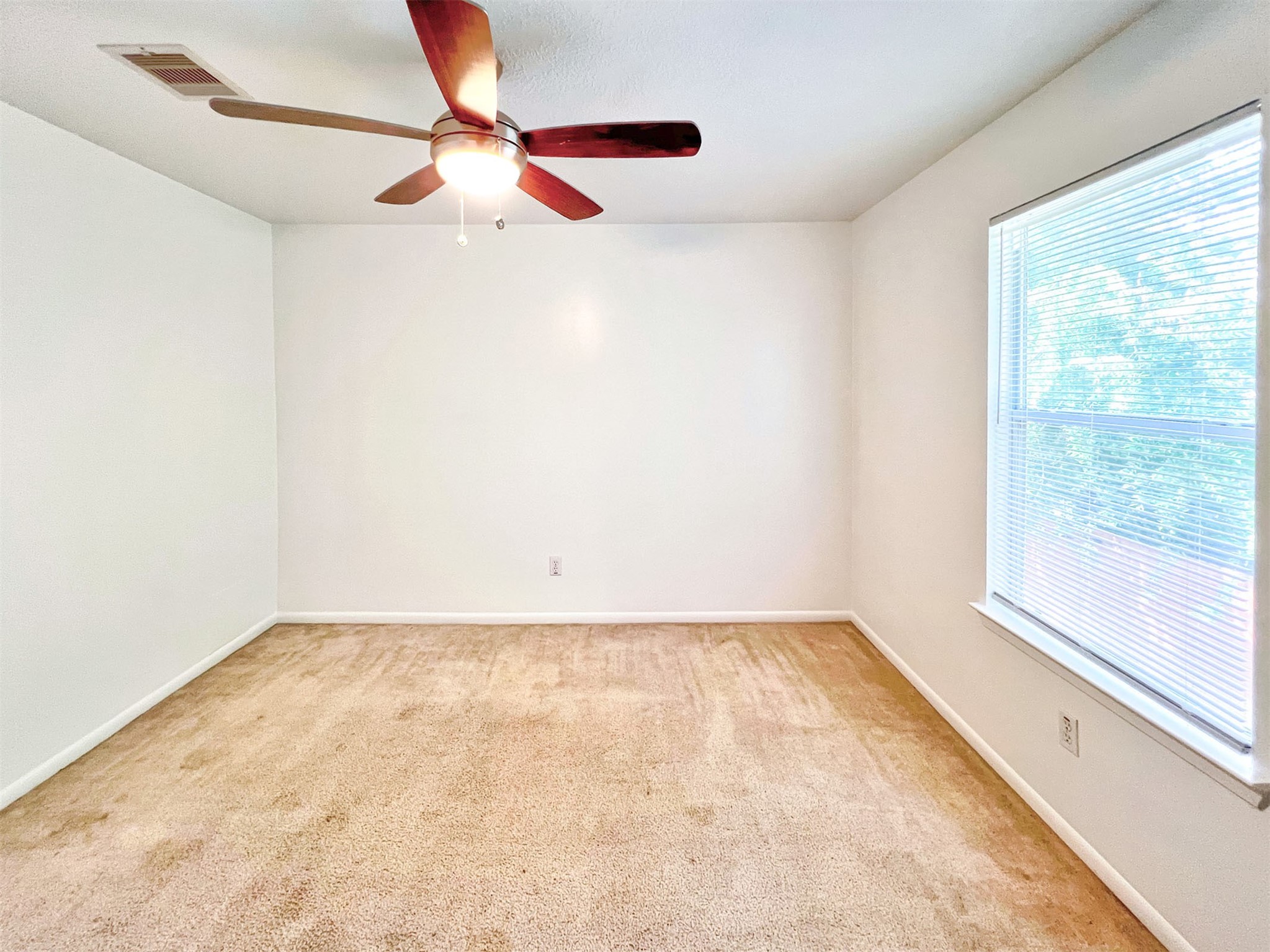 17250 April Valley Court Houston, TX 77084 - Photo 25 of 33 Inviting Bedroom with Natural Light