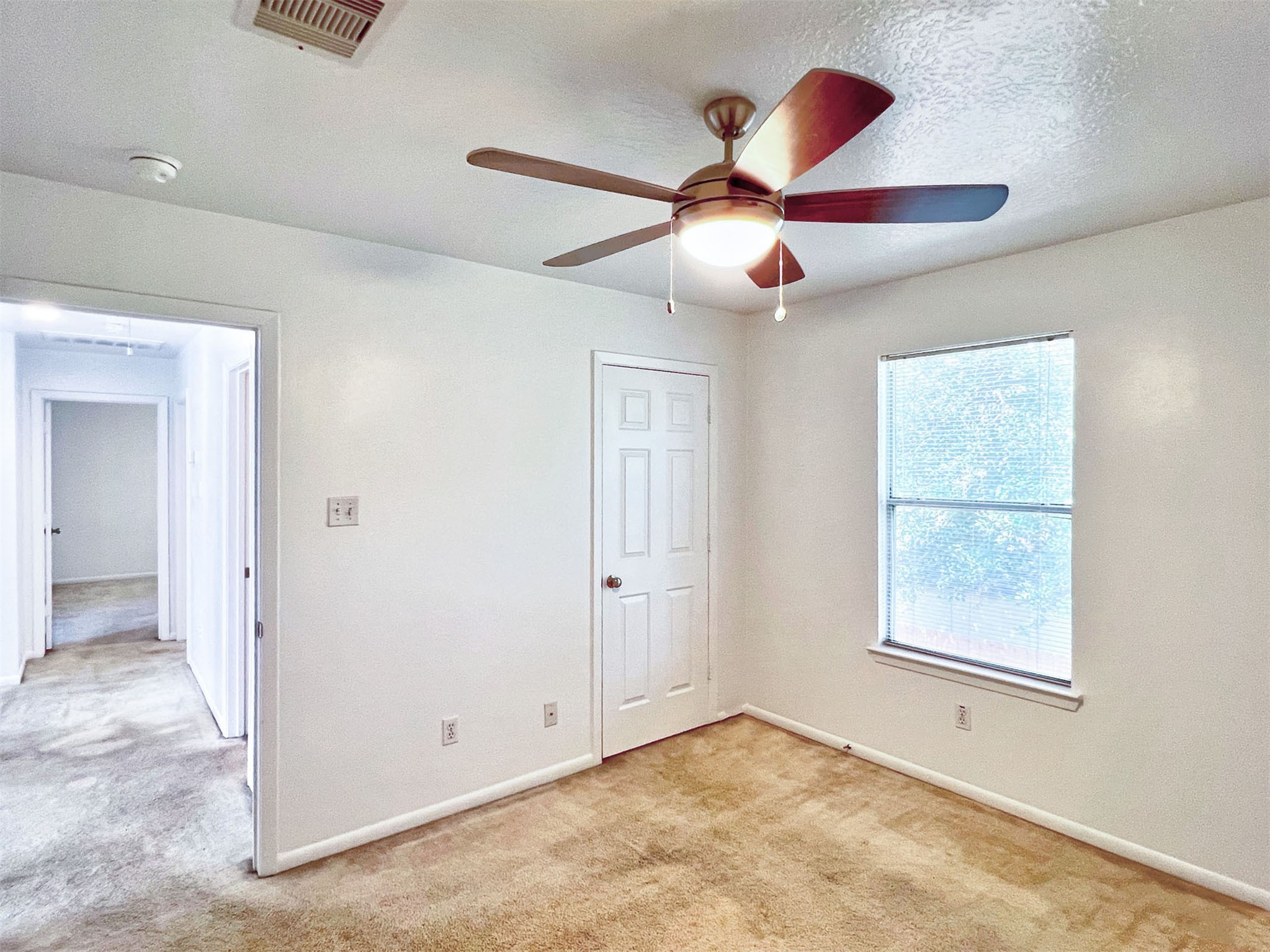 17250 April Valley Court Houston, TX 77084 - Photo 26 of 33 Inviting Bedroom with Natural Light