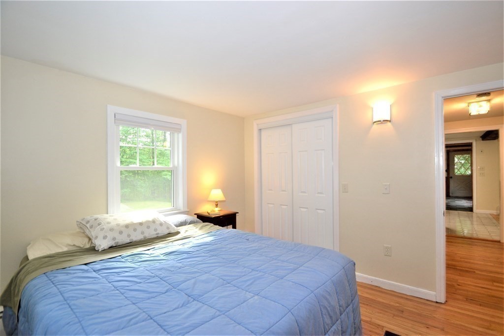 95 Pine Hill Road Ashland, MA 01721 - Photo 15 of 30 a bedroom with a bed and a window