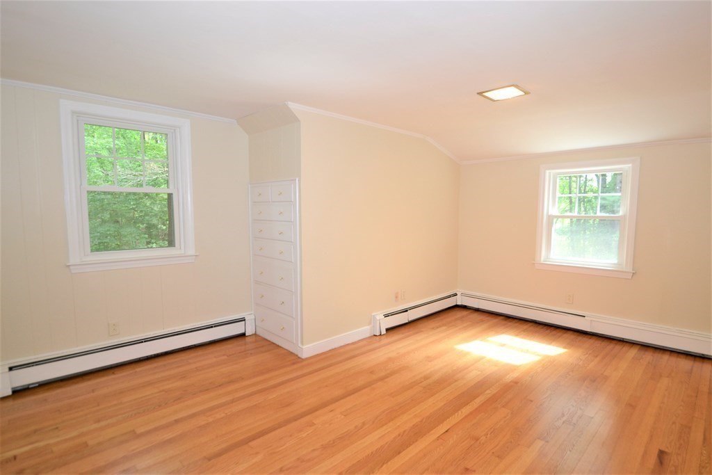 95 Pine Hill Road Ashland, MA 01721 - Photo 20 of 30 an empty room with wooden floor and windows