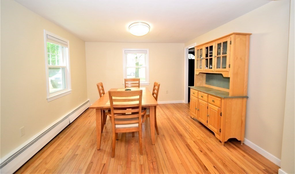 95 Pine Hill Road Ashland, MA 01721 - Photo 7 of 30 a view of dining room with furniture and wooden floor