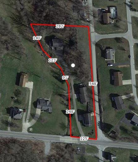 258 New Salem Road Uniontown, PA 15401 - Photo 6 of 6 a multi story building with lots of trees