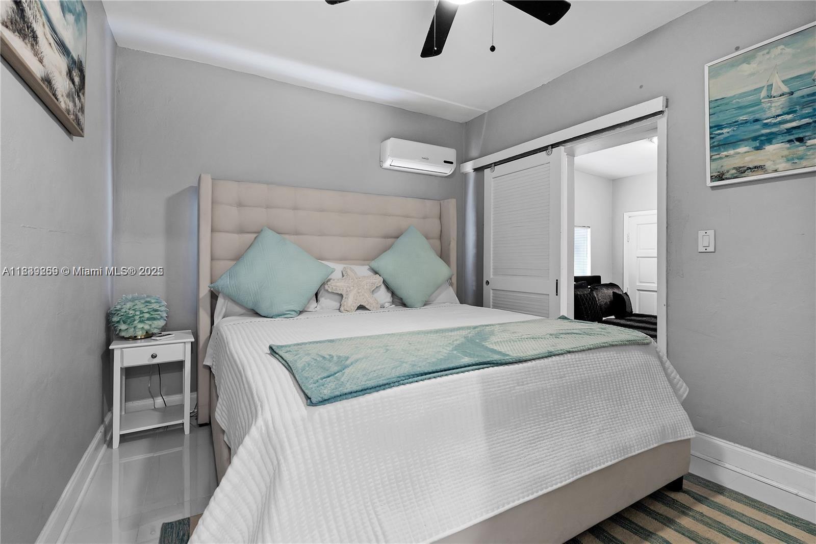 1761 Southwest 14th Street Miami, FL 33145 - Photo 25 of 37 a bedroom with a bed and furniture