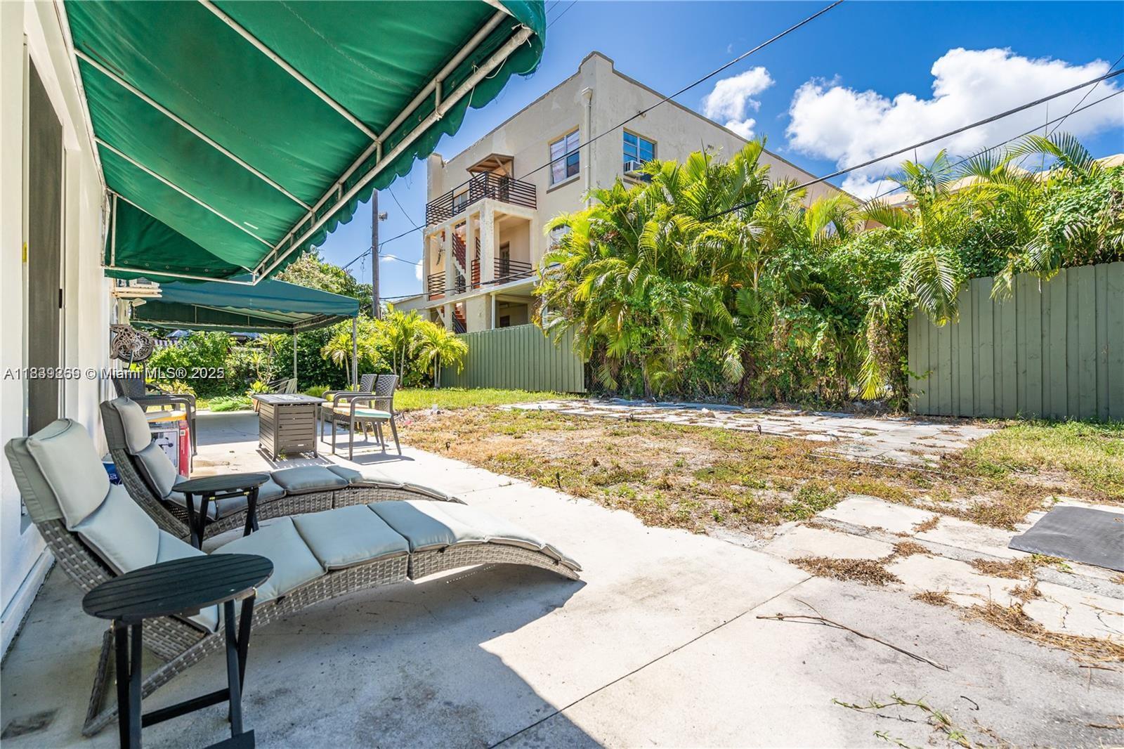 1761 Southwest 14th Street Miami, FL 33145 - Photo 5 of 37 a view of a backyard with a sitting area