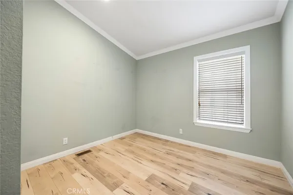 a view of a room that has a window in it