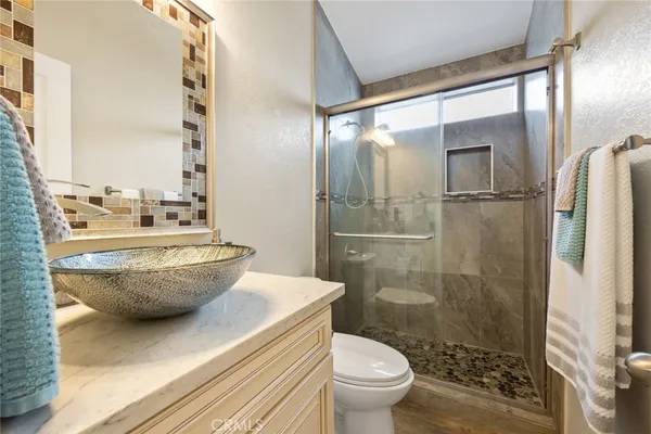 a view of a balcony with a potted plant