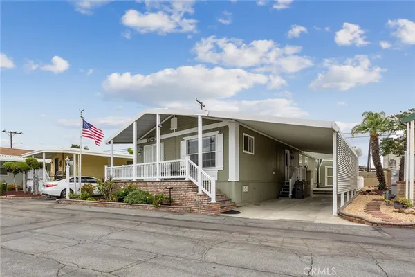 a front view of a house with street