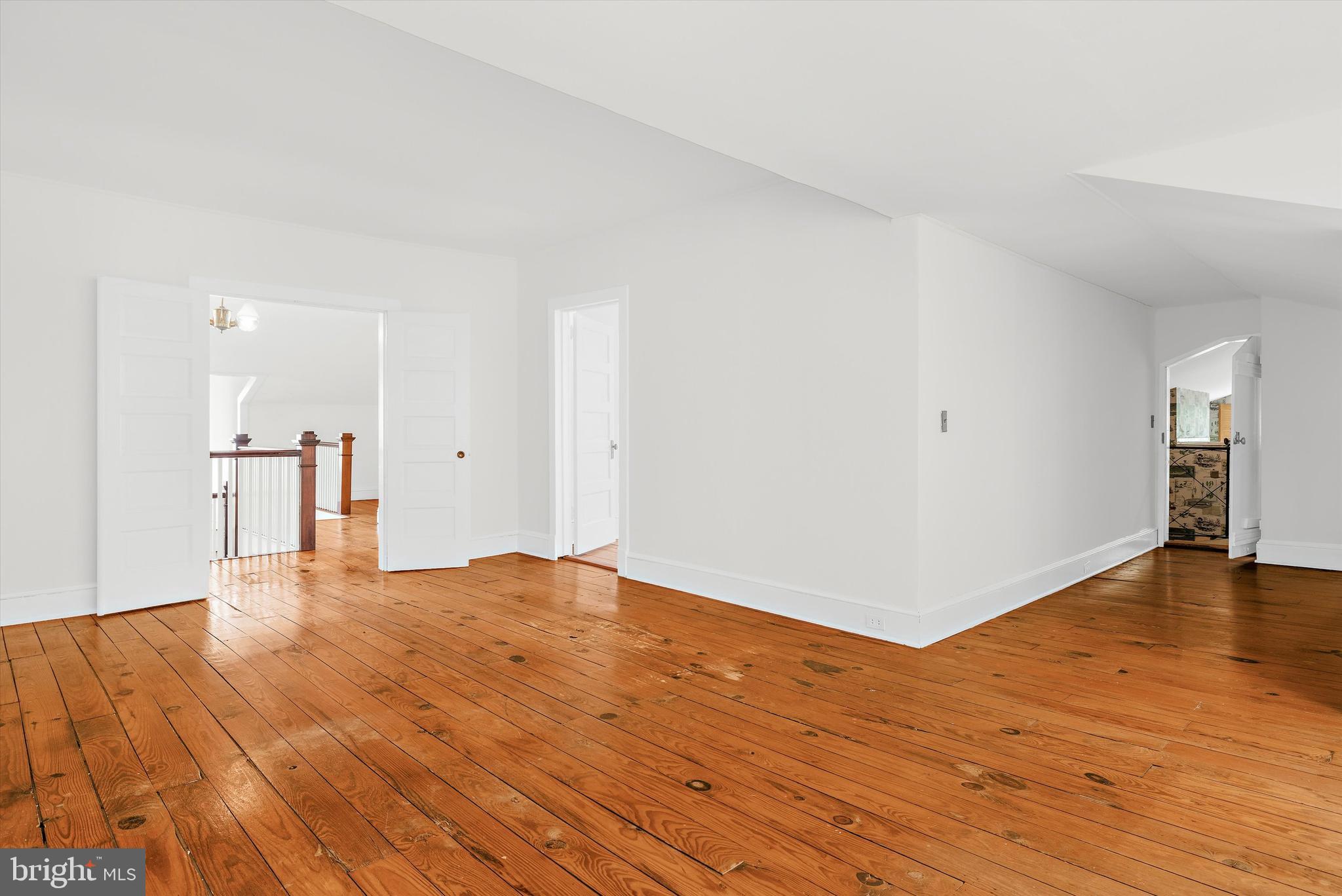 500 Nesbit Road Queenstown, MD 21658 - Photo 29 of 53 a view of empty room with wooden floor