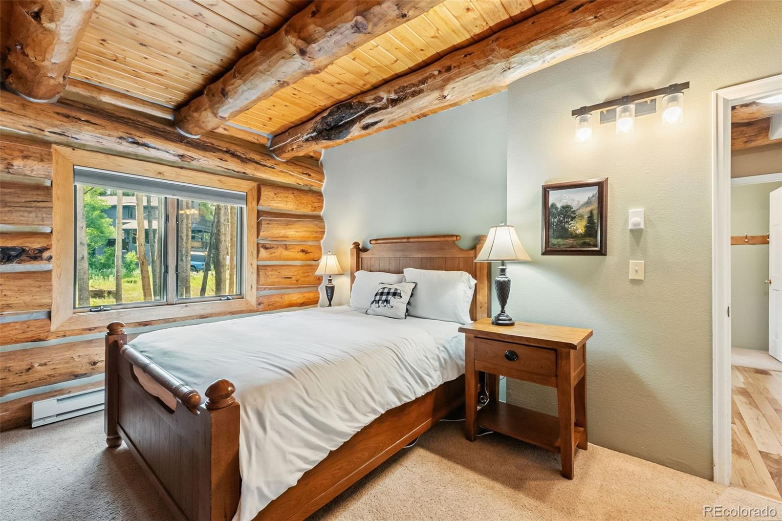 46 Indiana Creek Road Breckenridge, CO 80424 - Photo 11 of 50 a bedroom with a bed and a window