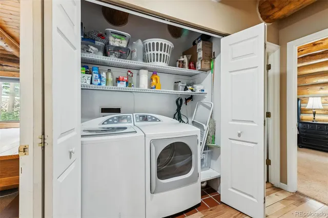 a utility room with dryer and washer