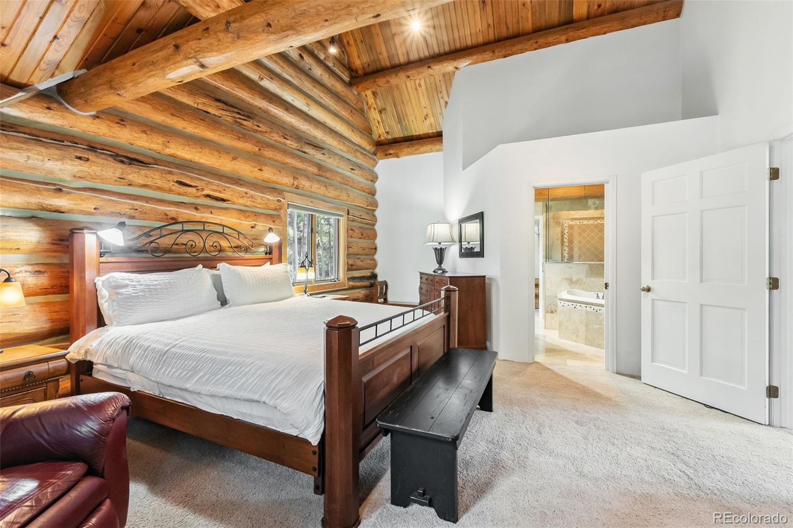 46 Indiana Creek Road Breckenridge, CO 80424 - Photo 21 of 50 a bedroom with a bed and a table