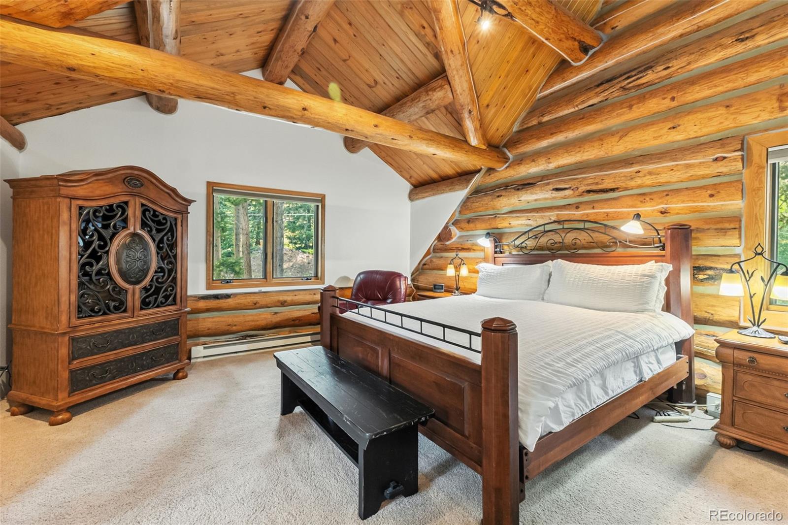 46 Indiana Creek Road Breckenridge, CO 80424 - Photo 22 of 50 a bed room with a bed and a window