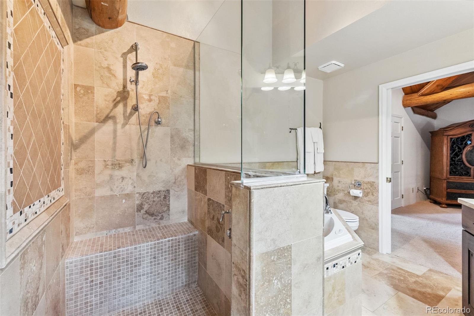 46 Indiana Creek Road Breckenridge, CO 80424 - Photo 25 of 50 a bathroom with a tub shower and a sink