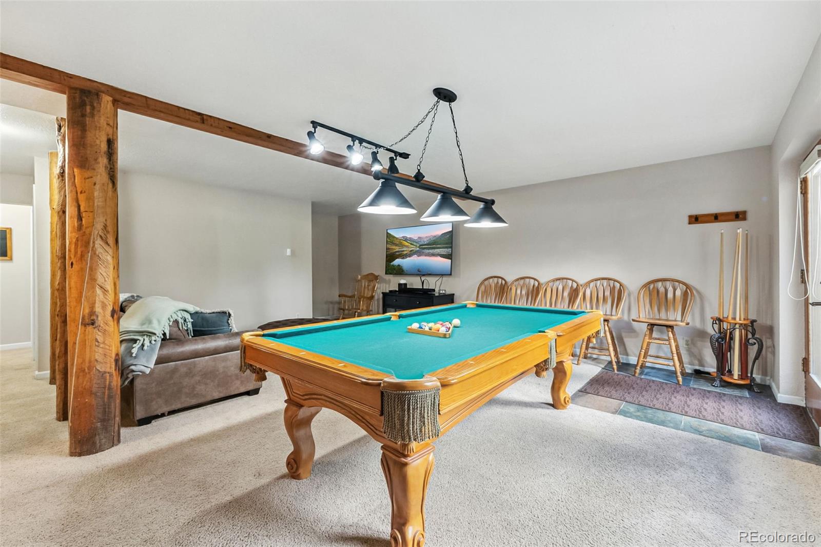 46 Indiana Creek Road Breckenridge, CO 80424 - Photo 28 of 50 a room with table tennis pool table and windows