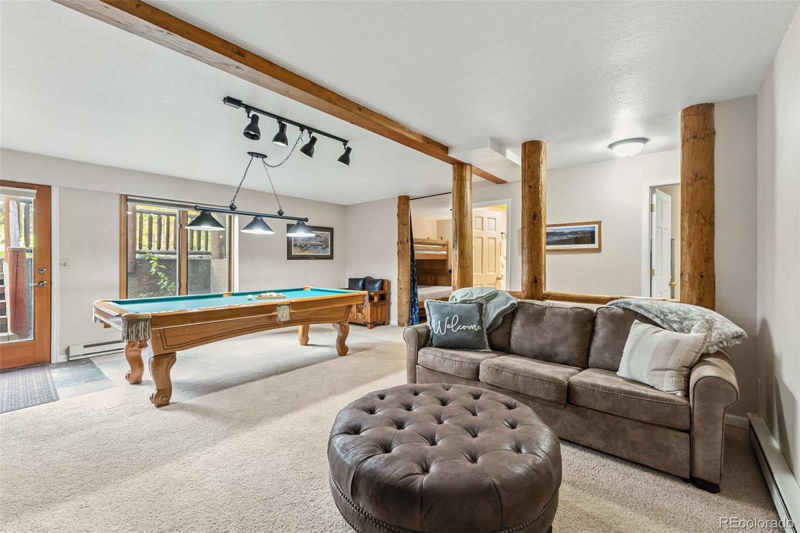 46 Indiana Creek Road Breckenridge, CO 80424 - Photo 29 of 50 a living room with furniture and a rug