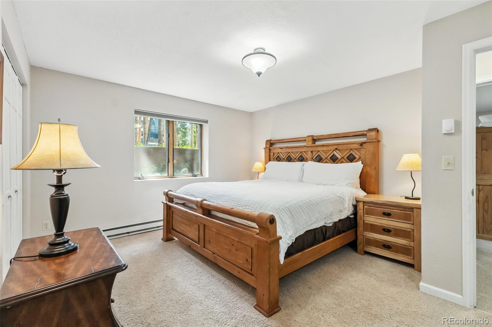 46 Indiana Creek Road Breckenridge, CO 80424 - Photo 36 of 50 a bedroom with a bed and a window