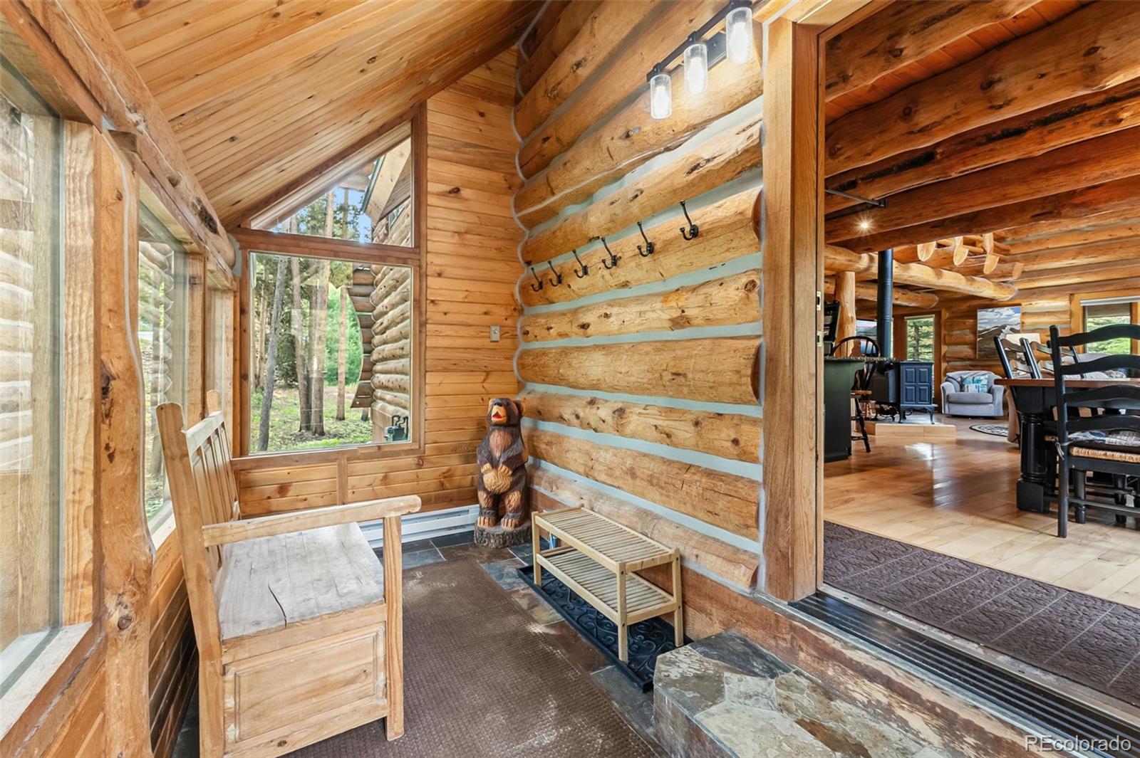 46 Indiana Creek Road Breckenridge, CO 80424 - Photo 39 of 50 a room with wooden floor and furniture