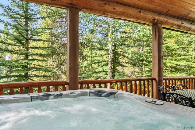 a view of porch with a bench