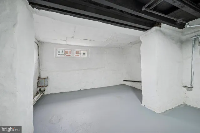 a view of room with wooden ceiling