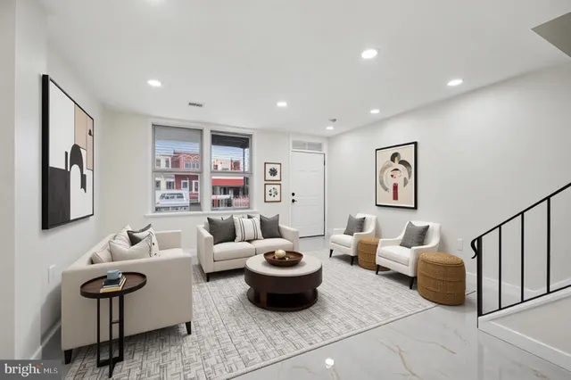 a living room with furniture and a couch