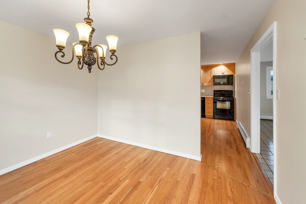81 Magnolia Road Manchester, NH 03104 - Photo 16 of 35 a view of livingroom with furniture and wooden floor