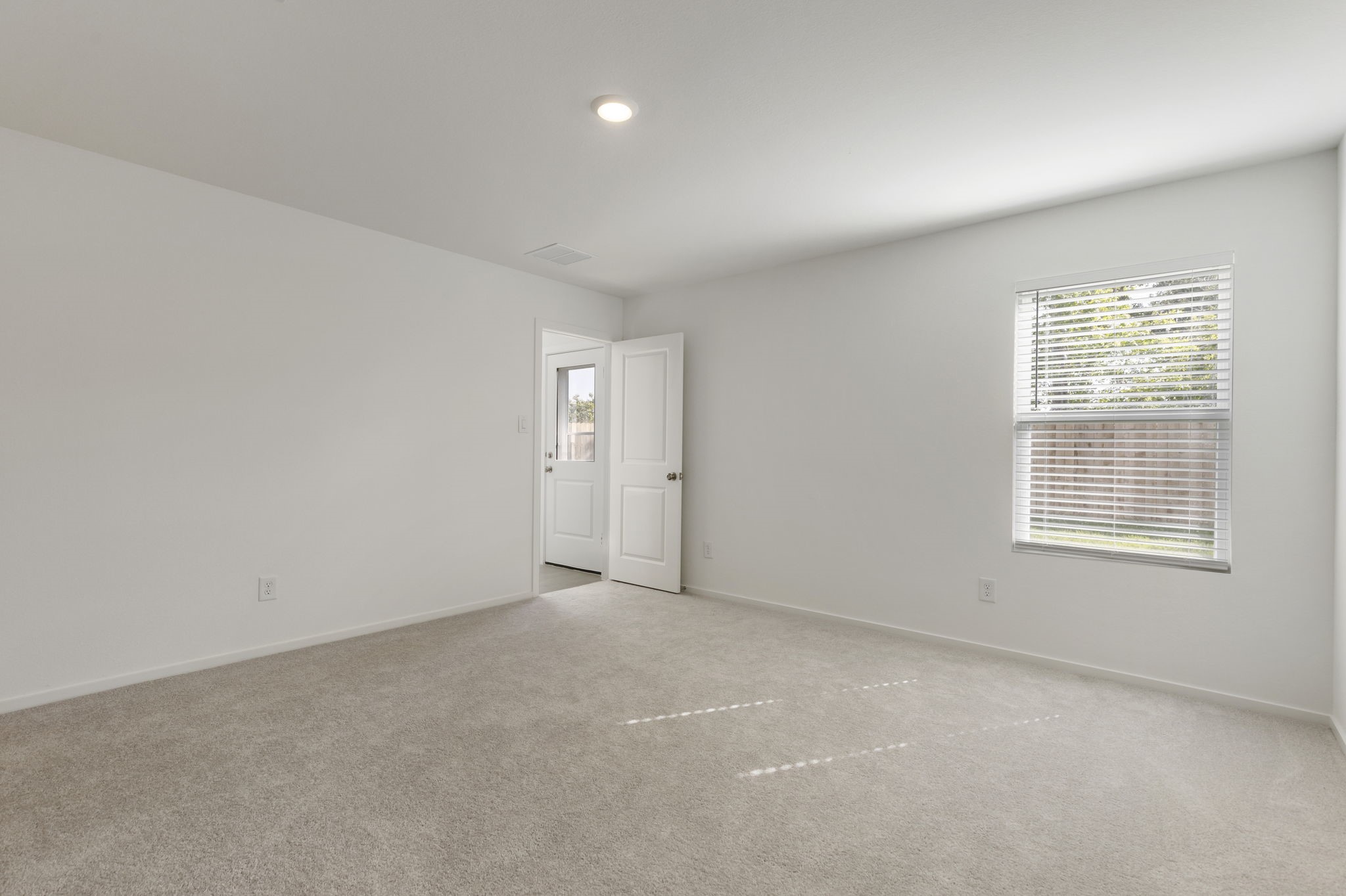 490 Southern Magnolia Way Magnolia, TX 77354 - Photo 11 of 25 an empty room with windows