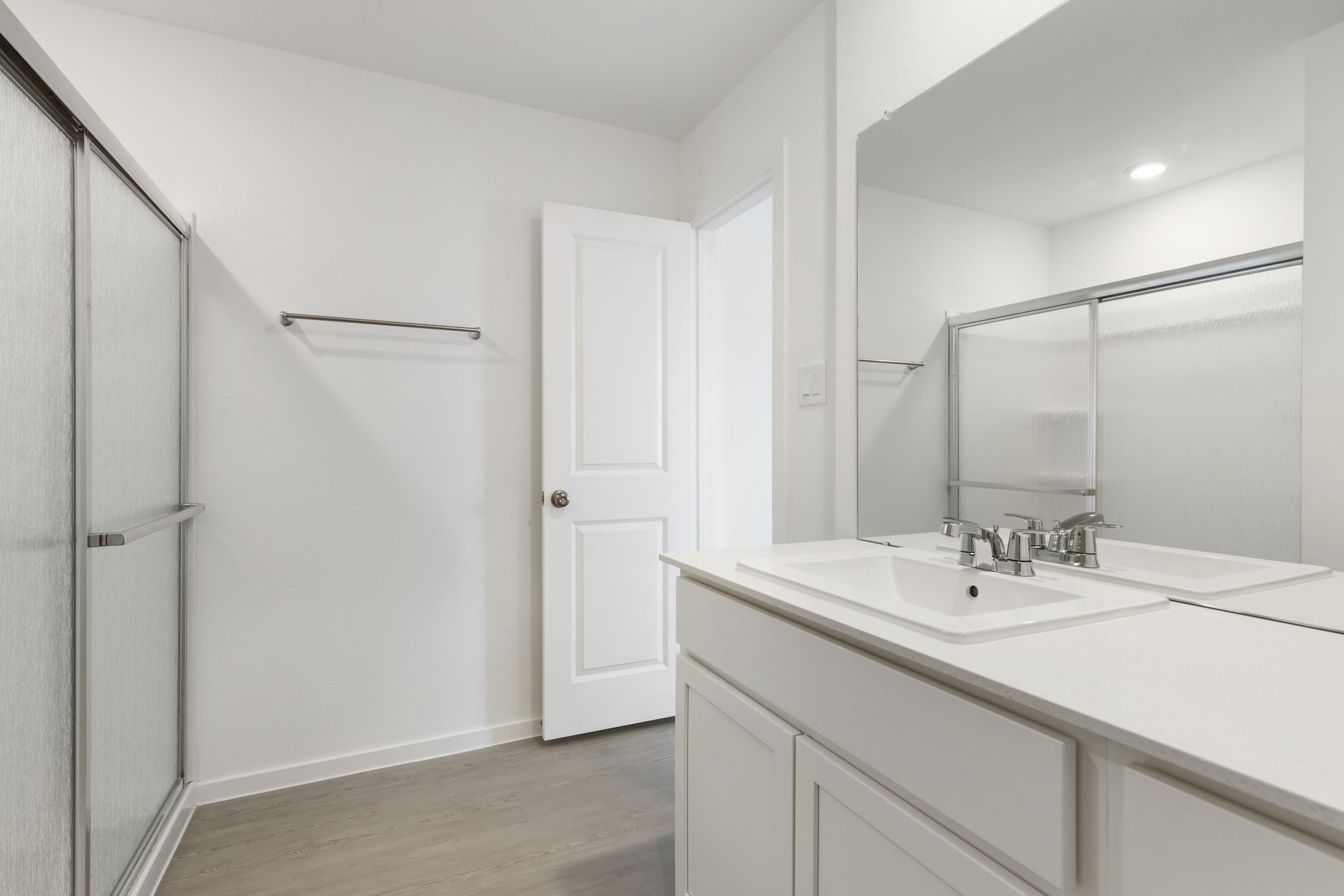 490 Southern Magnolia Way Magnolia, TX 77354 - Photo 13 of 25 a bathroom with a sink and a mirror