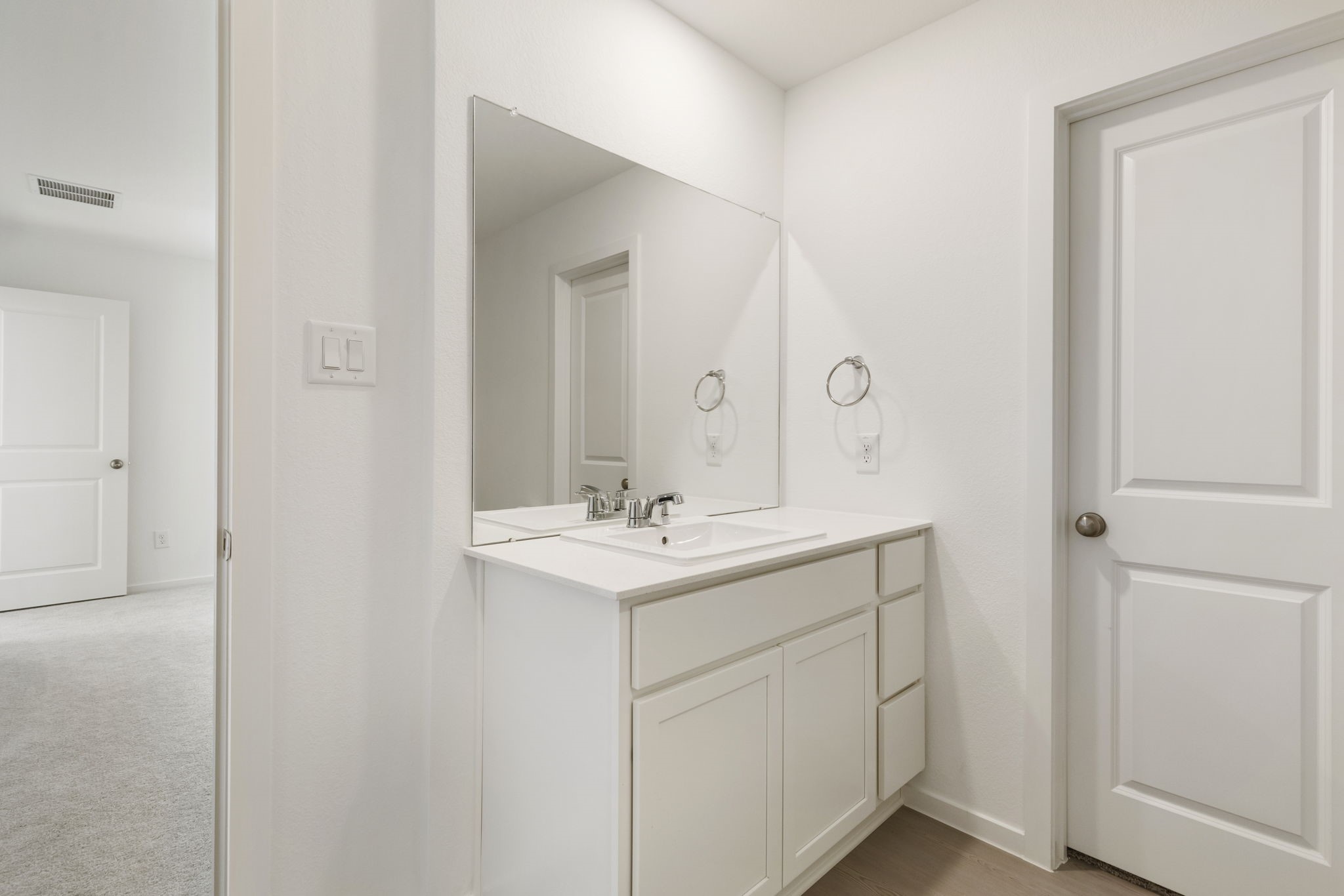 490 Southern Magnolia Way Magnolia, TX 77354 - Photo 15 of 25 a bathroom with a sink and a mirror