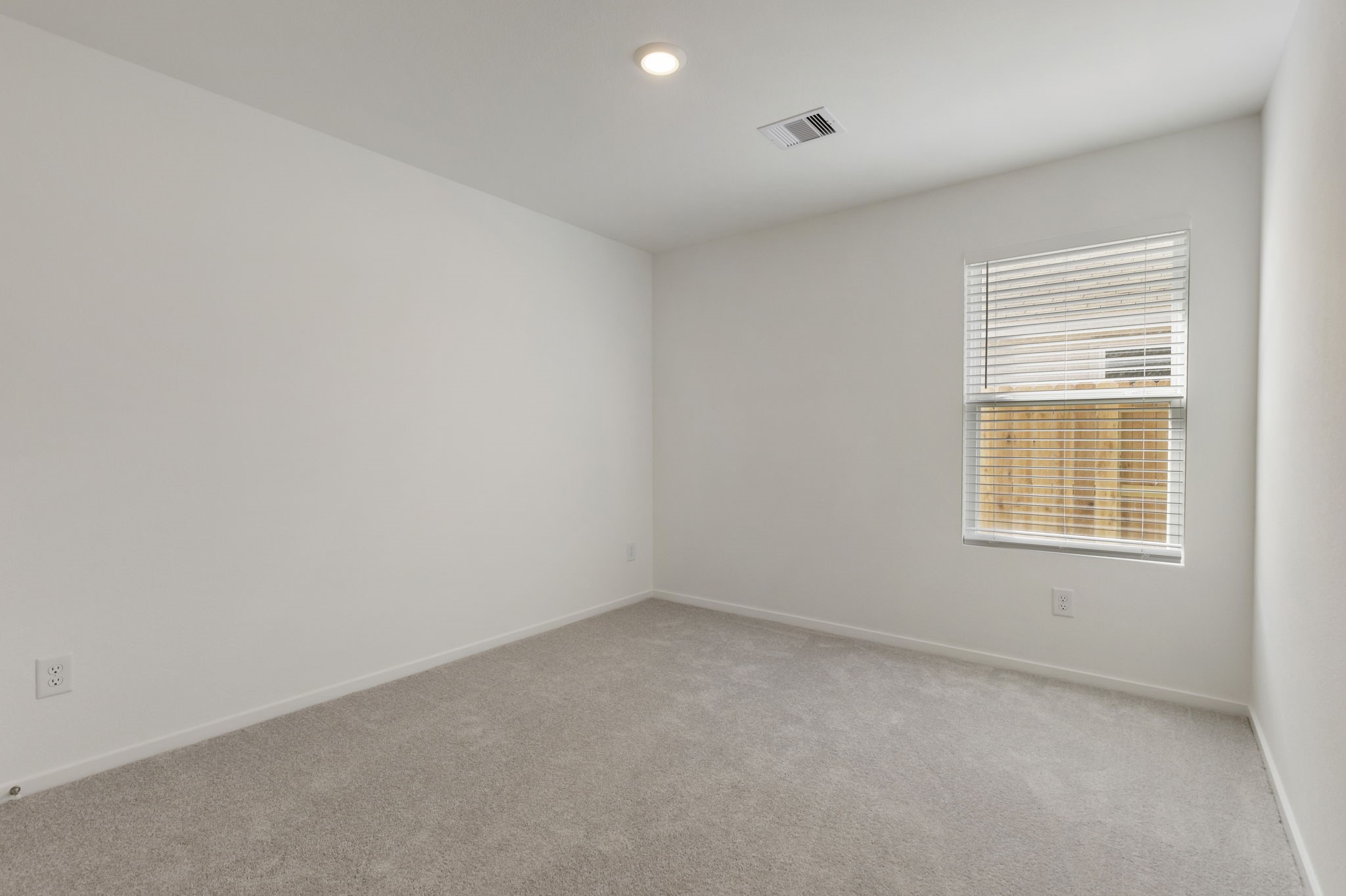 490 Southern Magnolia Way Magnolia, TX 77354 - Photo 17 of 25 an empty room with a window