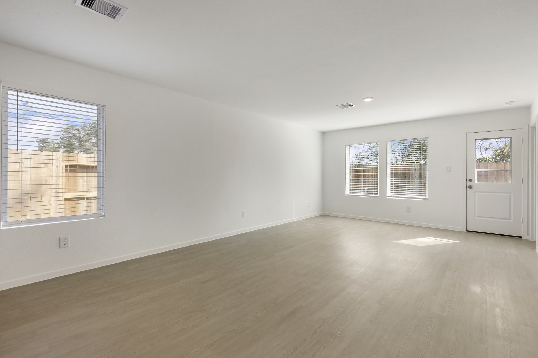 490 Southern Magnolia Way Magnolia, TX 77354 - Photo 3 of 25 an empty room with windows
