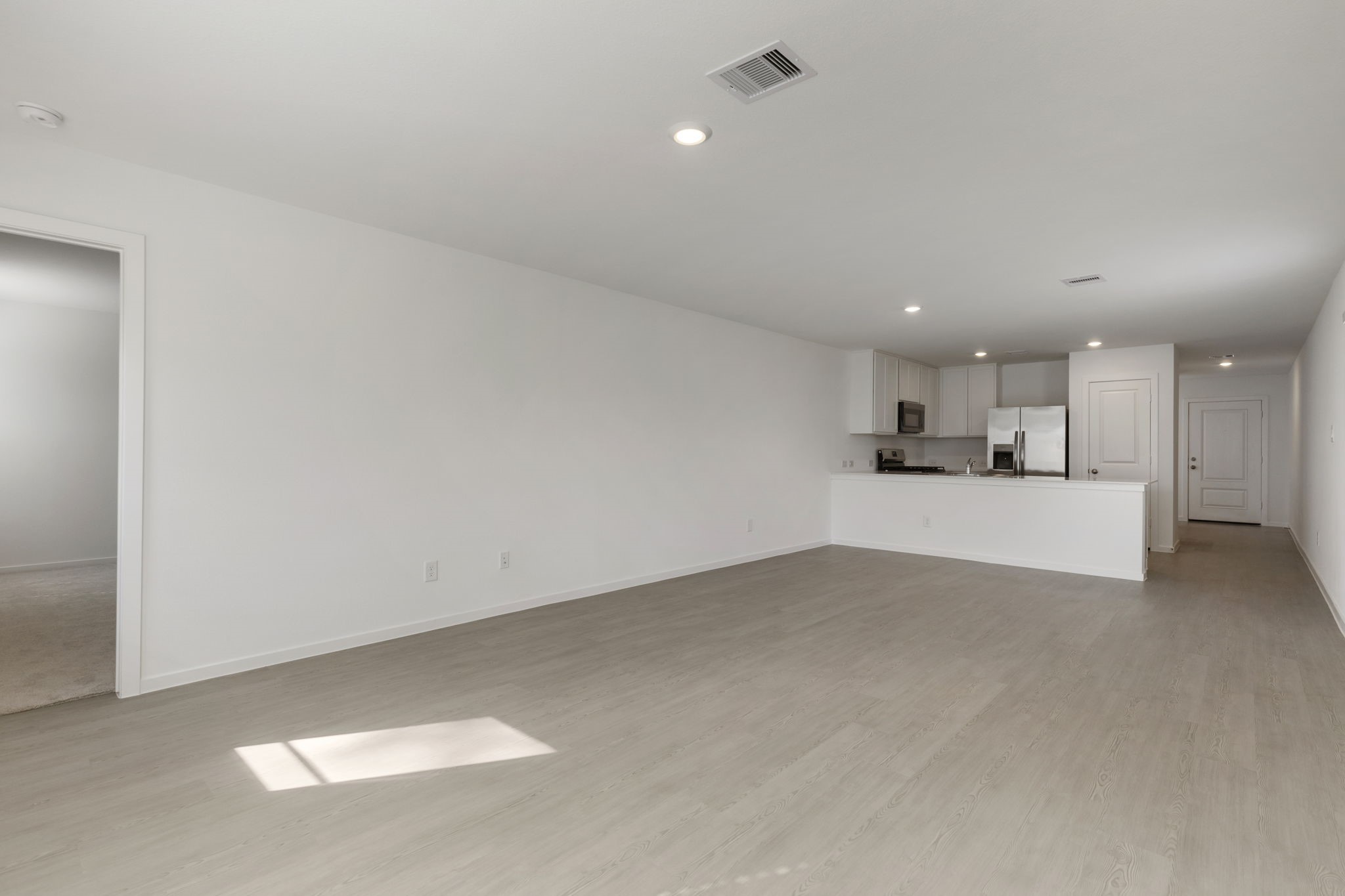 490 Southern Magnolia Way Magnolia, TX 77354 - Photo 25 of 25 a view of a kitchen with a sink and cabinets