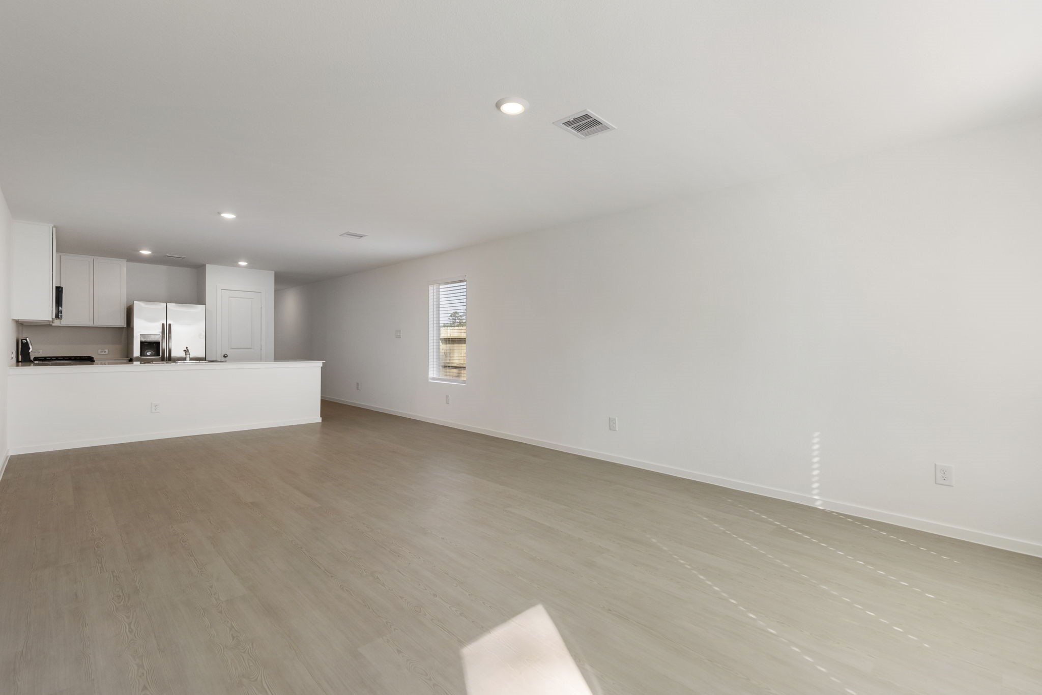 490 Southern Magnolia Way Magnolia, TX 77354 - Photo 5 of 25 a view of a kitchen with a sink