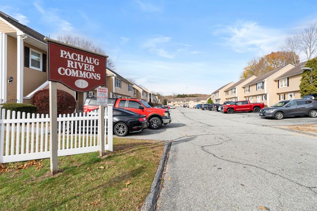 a view of a street with cars