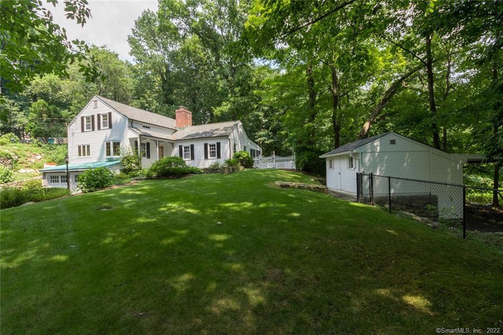 COUNTRY RETREAT WITH LARGE STORAGE SHED, 2 CAR GARAGE, LARGE PATIO FOR ENTERTAINING