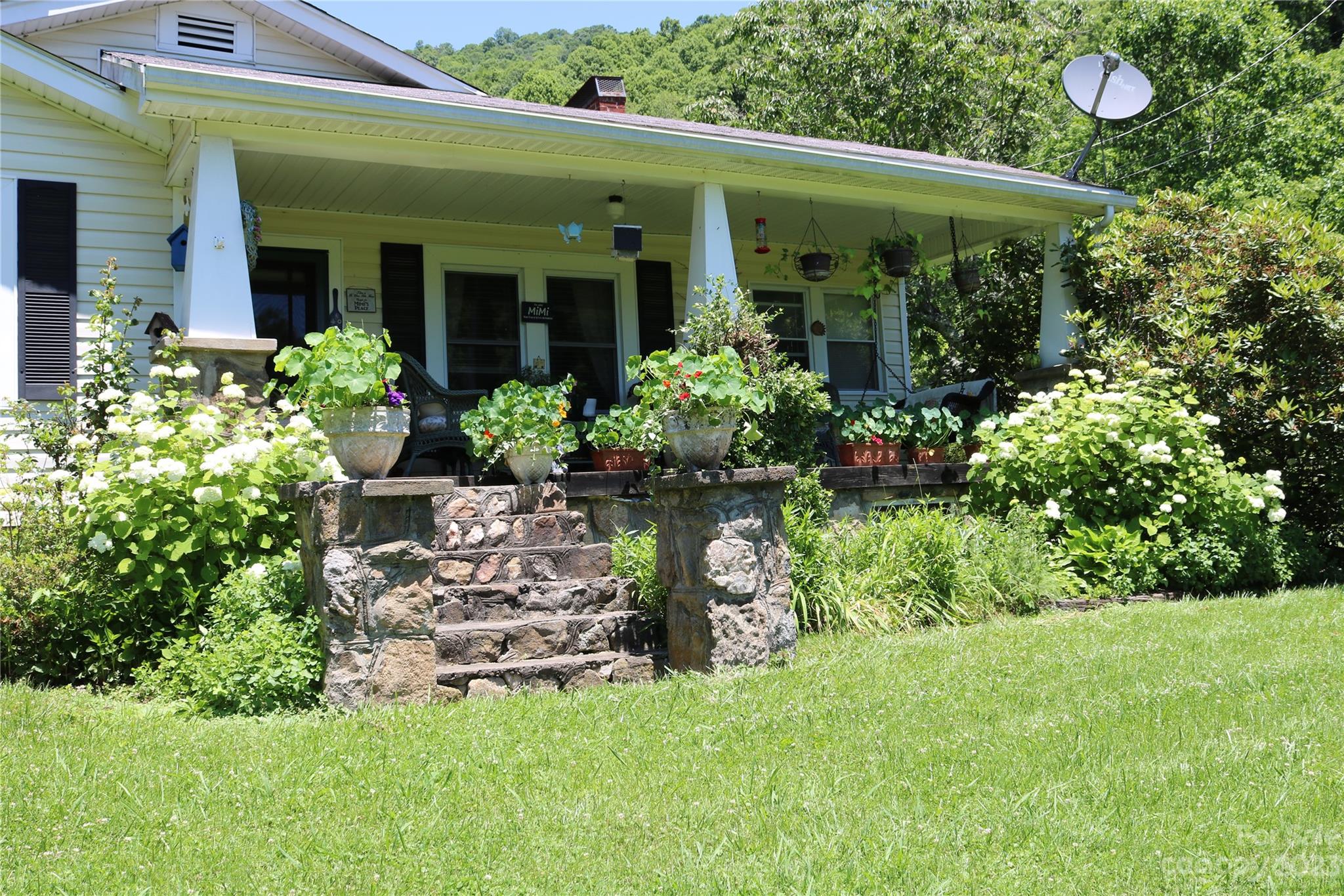 164 Rabbit Run Marshall, NC 28753 - Photo 14 of 27 a front view of a house with a yard