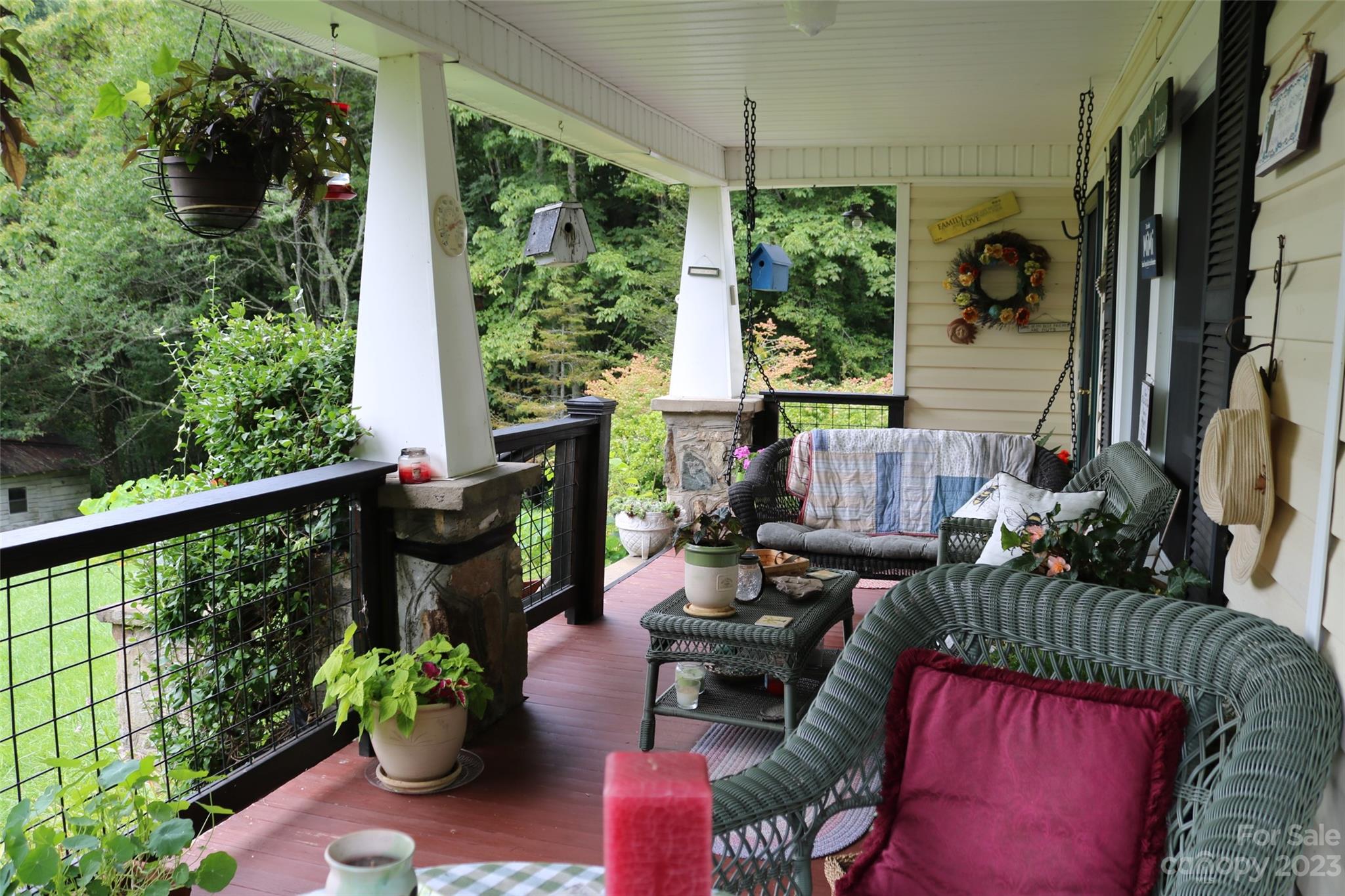 164 Rabbit Run Marshall, NC 28753 - Photo 15 of 27 a view of balcony with furniture potted plants