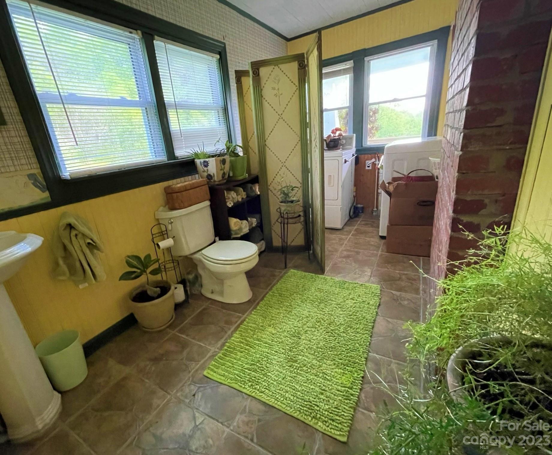 164 Rabbit Run Marshall, NC 28753 - Photo 16 of 27 a bathroom with a sink toilet and tub
