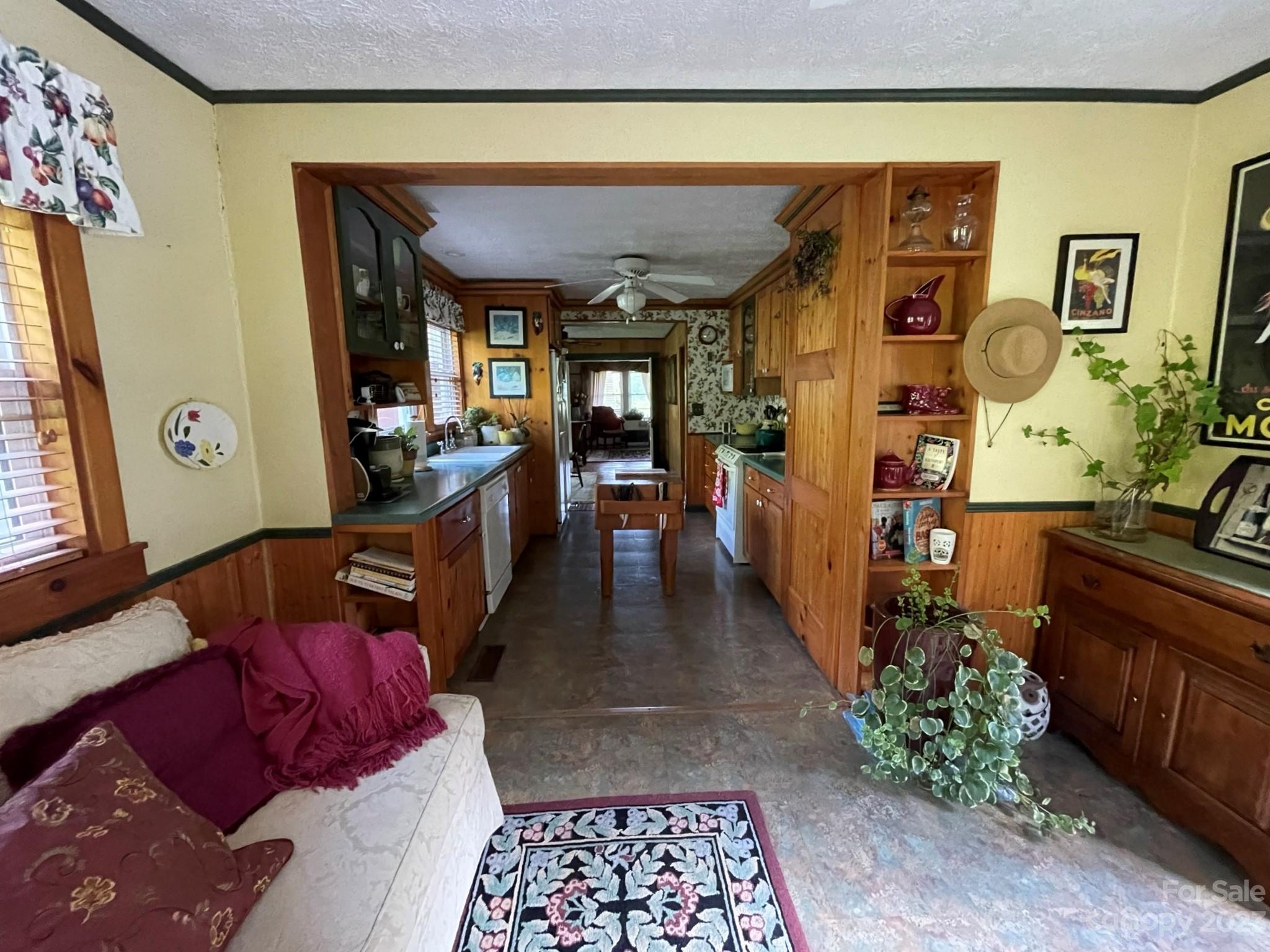 164 Rabbit Run Marshall, NC 28753 - Photo 3 of 27 a living room with furniture and a fireplace