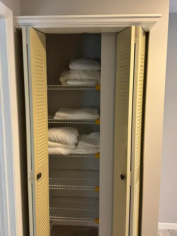 a bathroom with a shower and a window