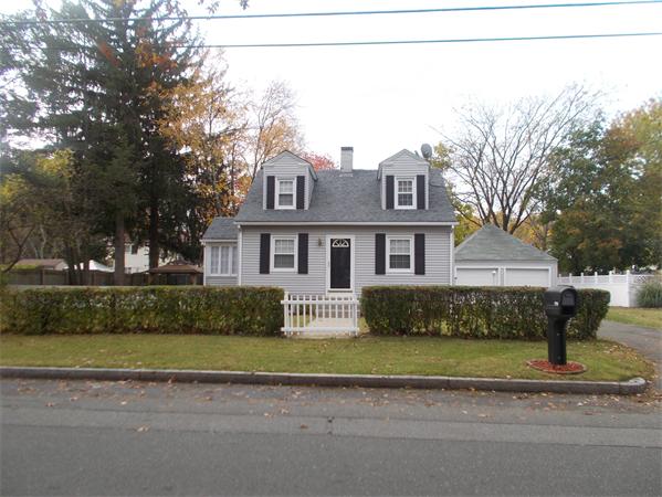 170 Lucerne Road Springfield, MA 01119 - Photo 1 of 28 a front view of a house with a garden