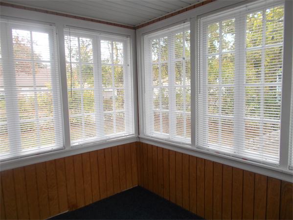 170 Lucerne Road Springfield, MA 01119 - Photo 16 of 28 a view of an empty room with wooden floor and a window