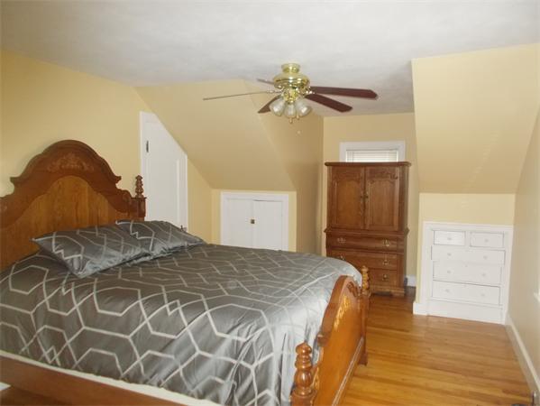170 Lucerne Road Springfield, MA 01119 - Photo 19 of 28 a bedroom with a bed and cabinets