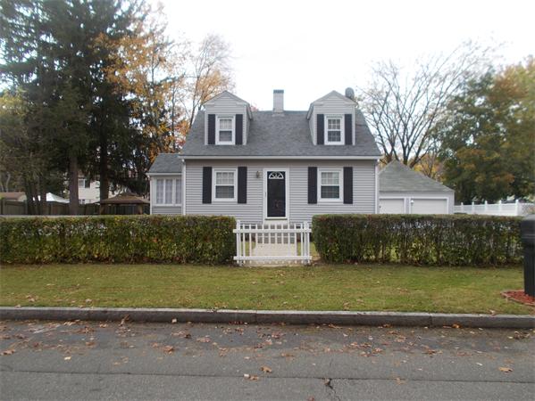 170 Lucerne Road Springfield, MA 01119 - Photo 2 of 28 a front view of a house with a garden