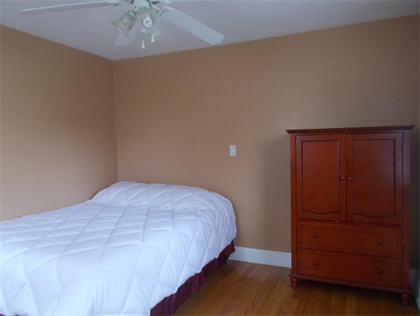 170 Lucerne Road Springfield, MA 01119 - Photo 21 of 28 a bedroom with a bed and a dresser