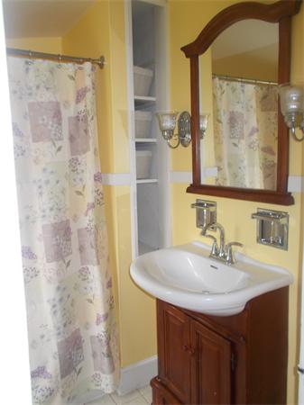 170 Lucerne Road Springfield, MA 01119 - Photo 23 of 28 a bathroom with a sink and a mirror